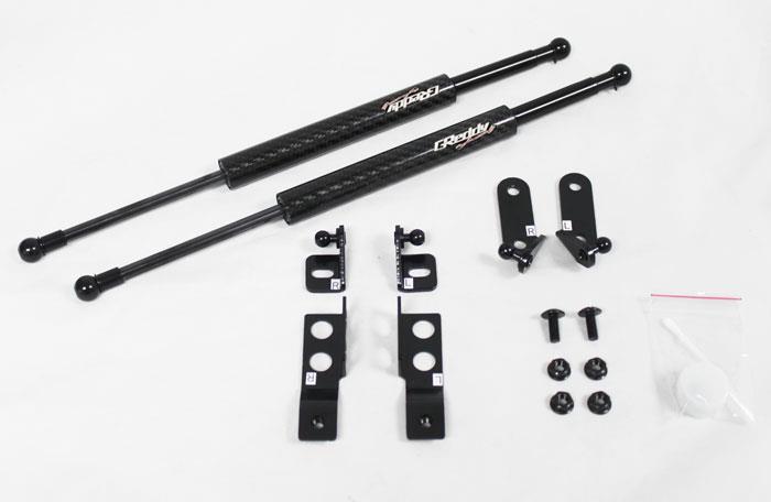 GReddy 08-11 Mitsubishi Evo X CZ4A Engine Hood Lifter Kit (Designed for OEM weight hoods.)