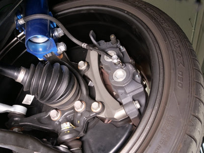 Cusco 23-25 Toyota GR Corolla Light Weight Front Brake Caliper Bracket - Billet Aluminum