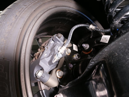 Cusco 23-25 Toyota GR Corolla Light Weight Rear Brake Caliper Bracket - Billet Aluminum